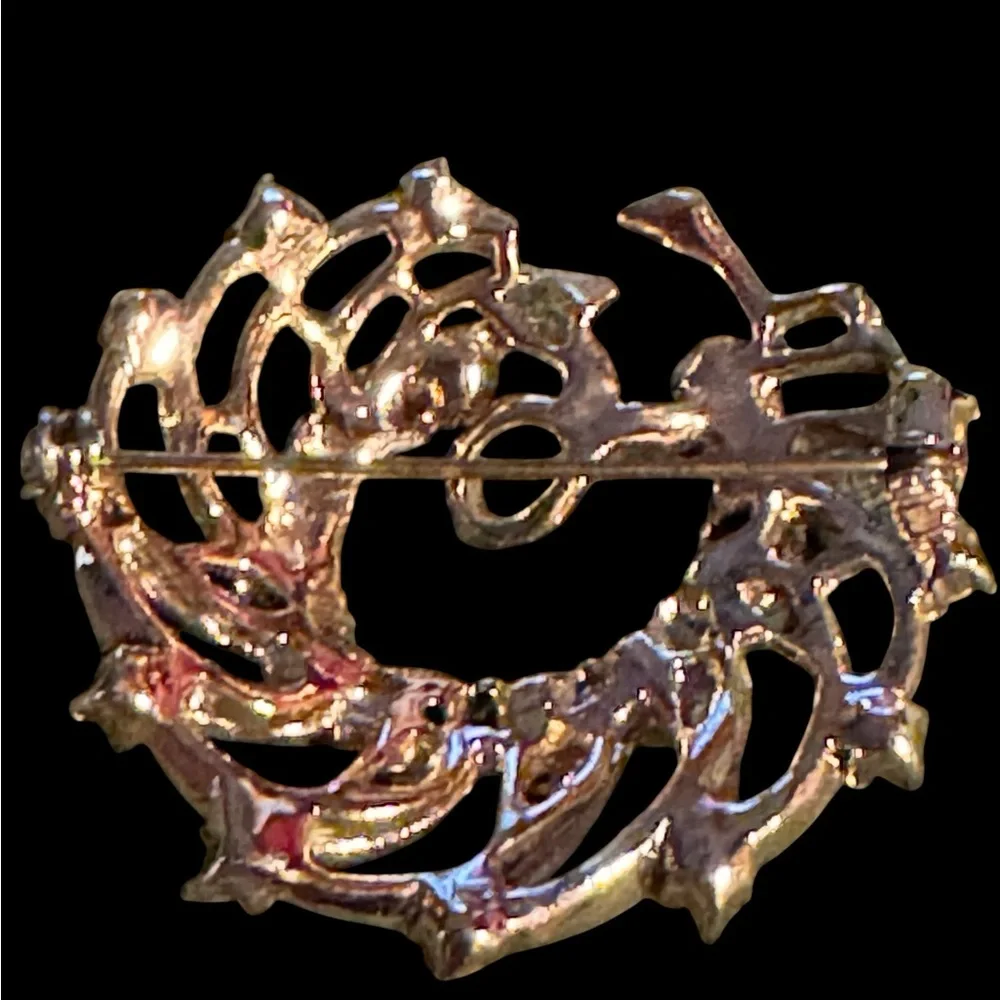 Two crystal brooches